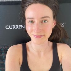 Health writer Katie Sims trying the PEMF infrared mat