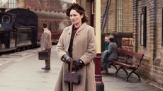 Mrs Hall stands at a station in All Creatures Great and Small season 6