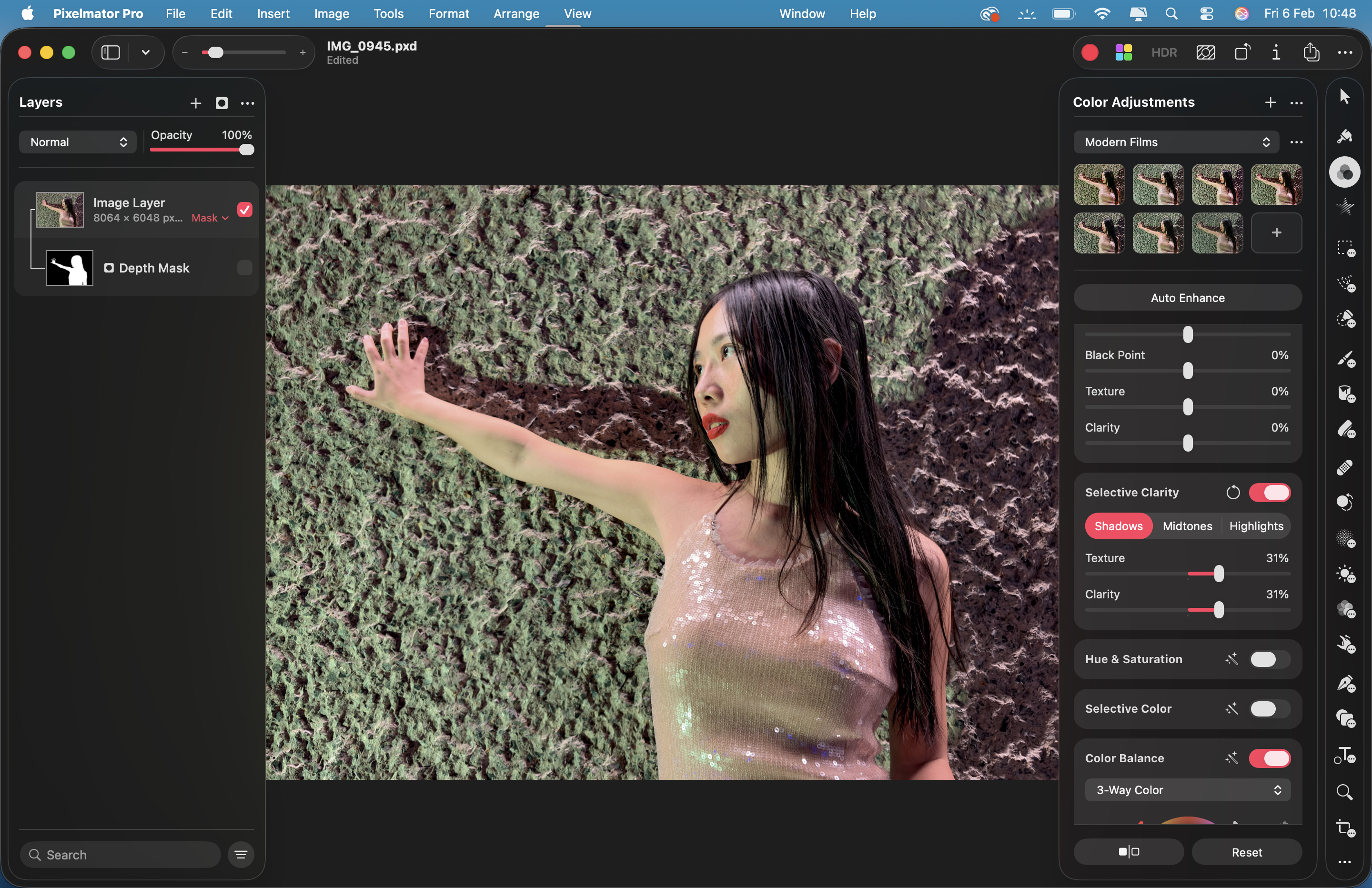 Pixelmator Pro 4: A shot of a model against a stone background. The Selective Clarity slider has been used to make the background &amp;lsquo;pop&amp;rsquo;.