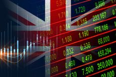 Union flag behind stock prices