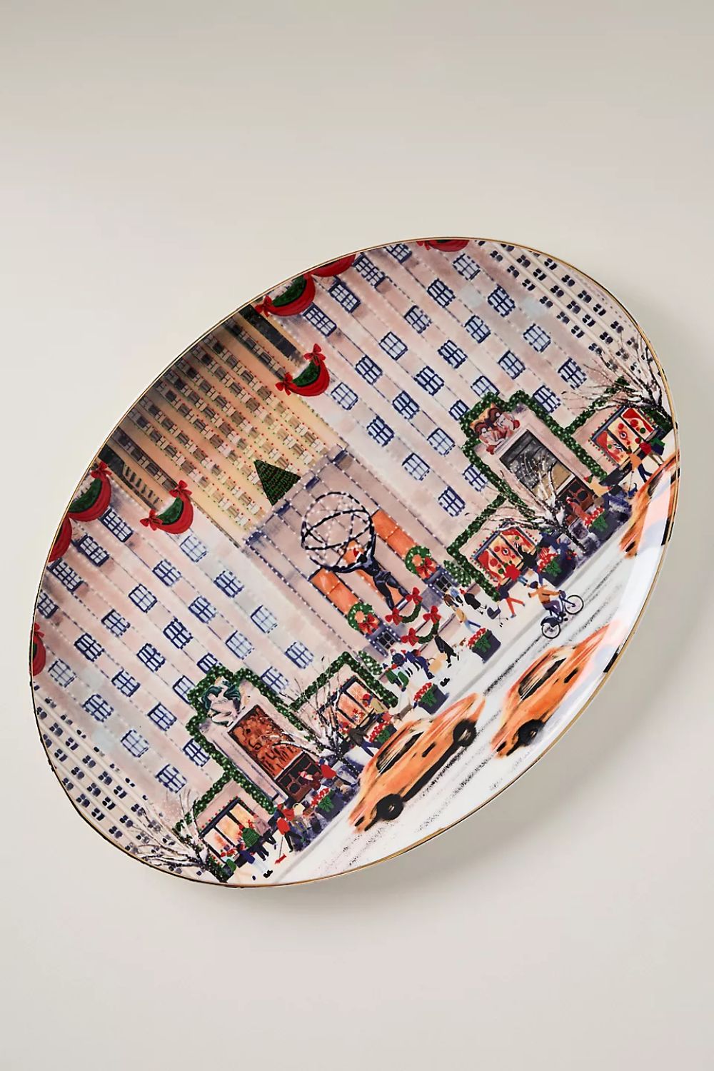 Oval platter with festive New York cityscape 