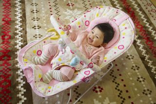 baby in bouncer