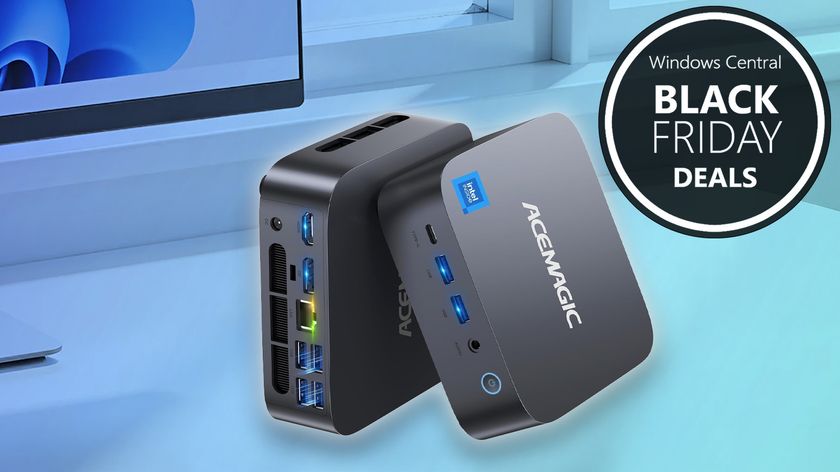 AceMagic M1 Mini PC render on a desk