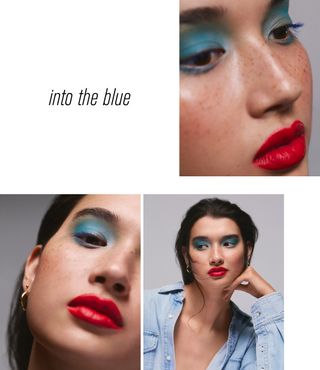 A model in a denim shirt wearing blue eyeshadow and a red lip
