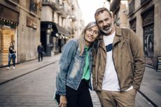 Portrait of a mature couple enjoying their romantic journey in Barcelona.