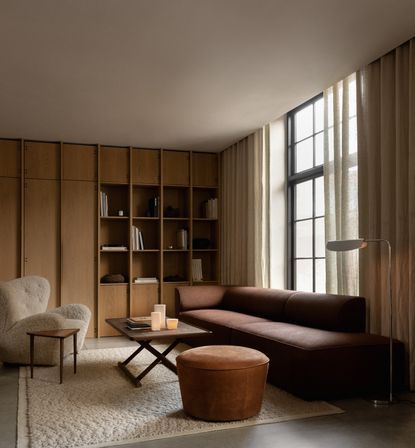 A living room in varying shades of brown and beige