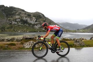 LAGOS DE COVADONGA SPAIN SEPTEMBER 01 Odd Christian Eiking of Norway and Team Intermarch Wanty Gobert Matriaux Red Leader Jersey competes during the 76th Tour of Spain 2021 Stage 17 a 1855km stage from Unquera to Lagos de Covadonga 1085m lavuelta LaVuelta21 on September 01 2021 in Lagos de Covadonga Spain Photo by Tim de WaeleGetty Images