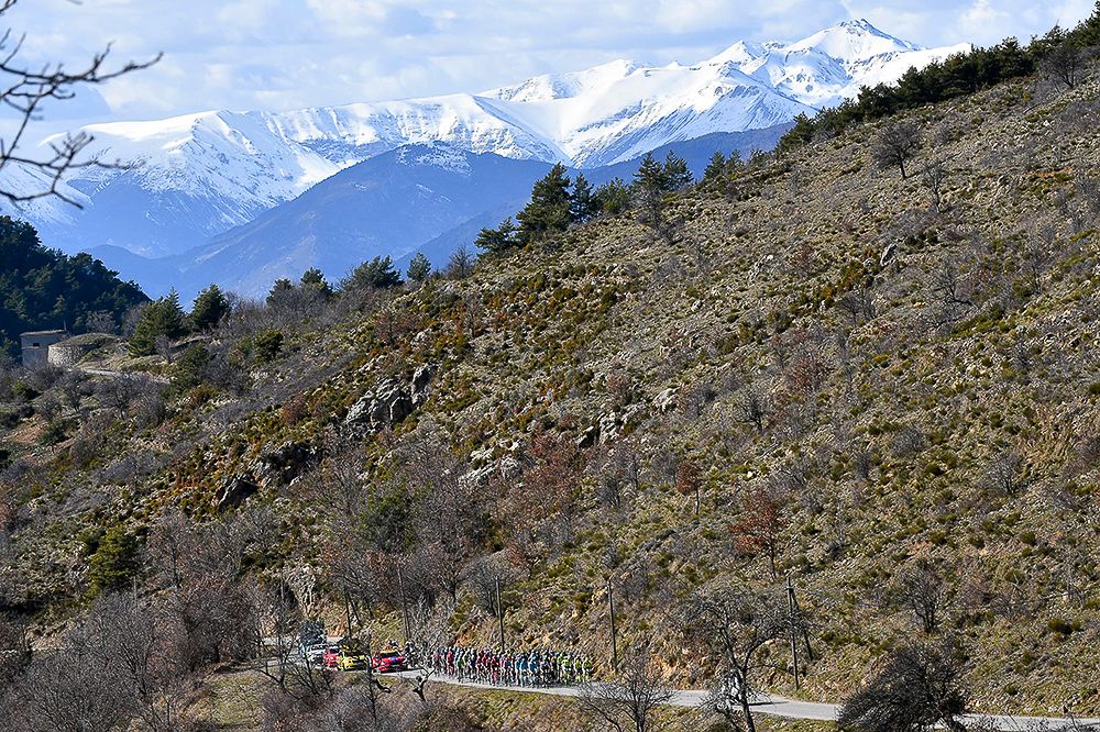 The peloton rides through the French countryside during stage 6 at Paris-Nice.