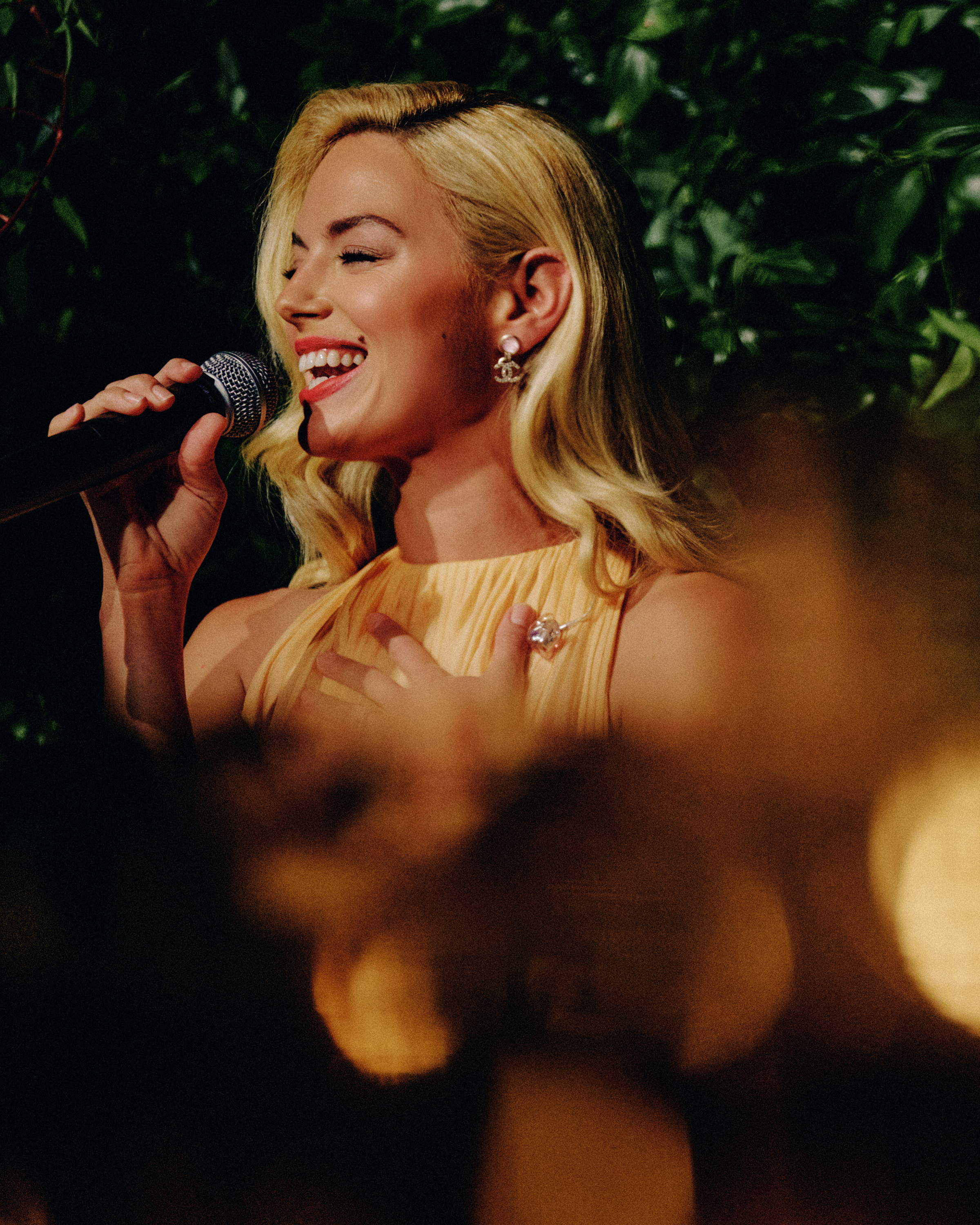 Ashe performs in the Hamptons with Chanel