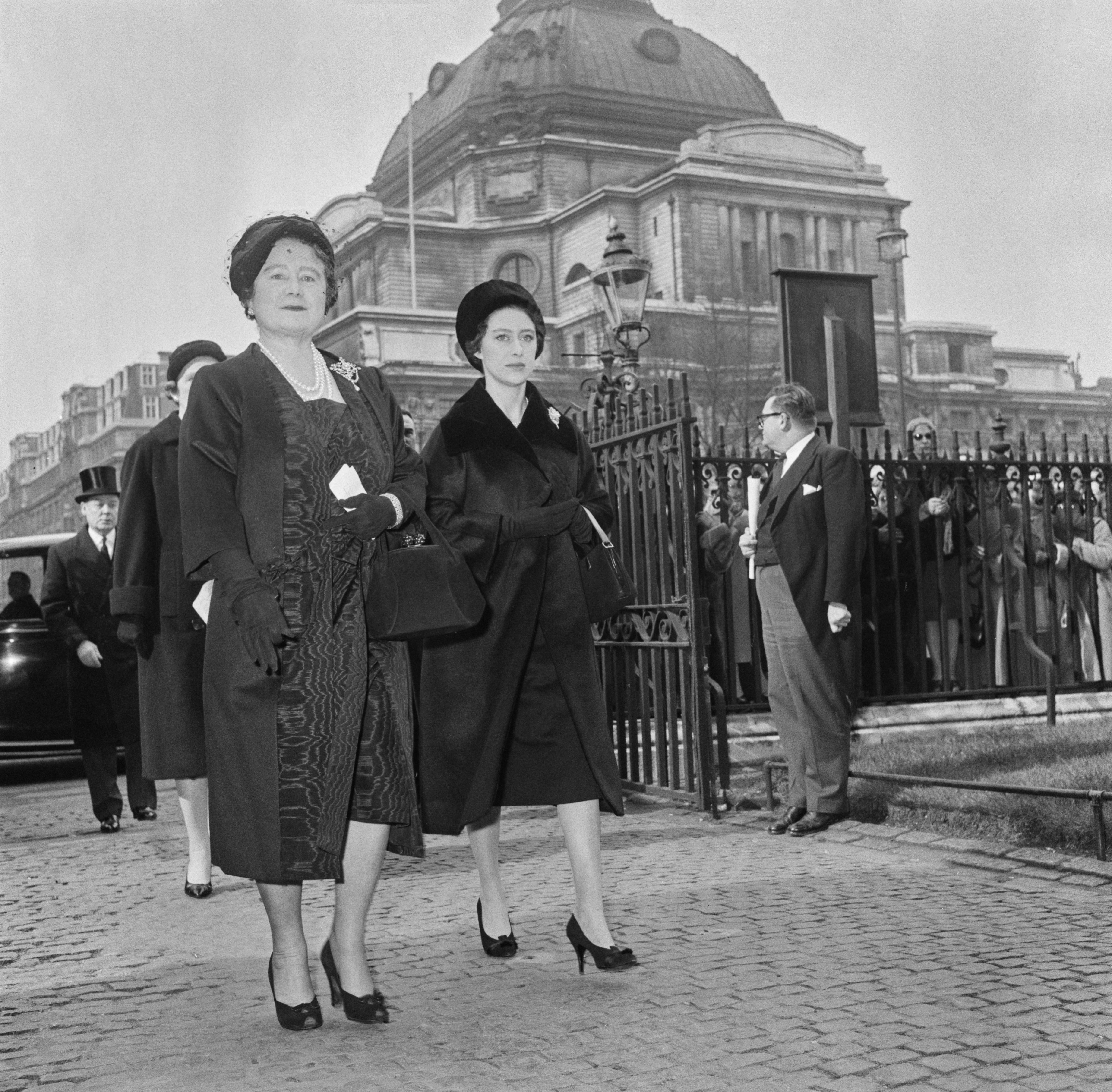 The Queen Mother and Princess Margaret walking into church
