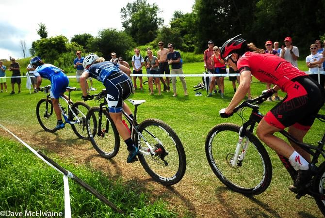 Katerina Nash (Luna Pro Team) followed by Chloe Woodruff with one lap to go