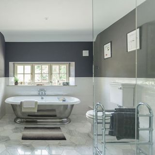 bathroom with misty fjord floor tiles imperial etoile loo and bath tub
