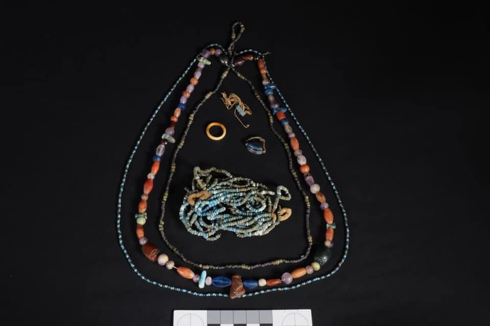 The teenage girl's jewelry, including her earrings, rings and necklaces.