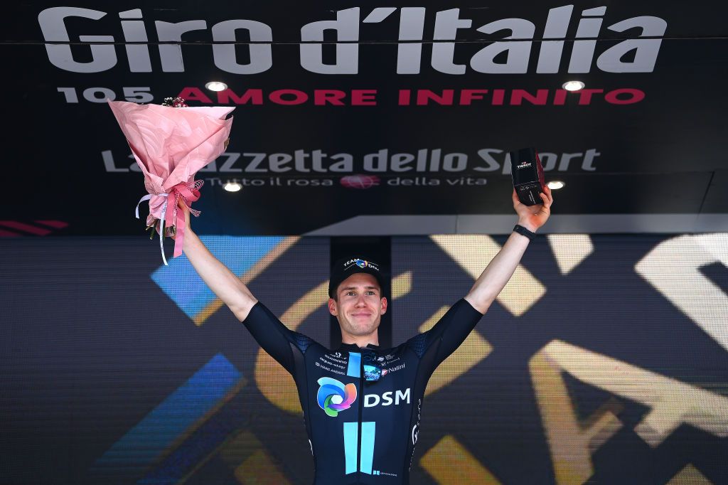 REGGIO EMILIA ITALY MAY 18 Alberto Dainese of Italy and Team DSM celebrates at podium as stage winner during the 105th Giro dItalia 2022 Stage 11 a 203km stage from Santarcangelo di Romagna to Reggio Emilia Giro WorldTour on May 18 2022 in Reggio Emilia Italy Photo by Tim de WaeleGetty Images