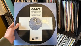 Gant All Night Long vinyl cover in front of records
