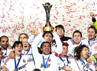 AC Milan players celebrate with the FIFA Club World Cup trophy after victory over Boca Juniors in the 2007 final.