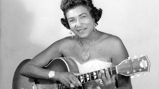 Memphis Minnie pictured with a Nationall acoustic guitar circa 1950