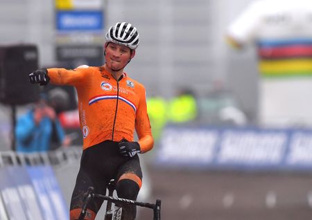 Mathieu van der Poel celebrates victory at the 2021 Cyclo-cross World Championships