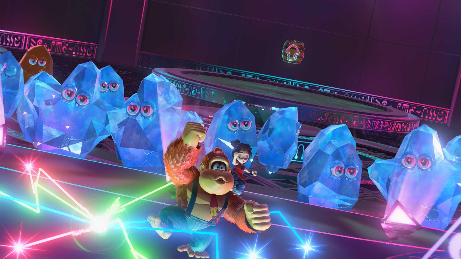 Donkey Kong Bananza screenshot showing Pauline on DK's back as they both dance in front of a crowd of ice blocks with eyes