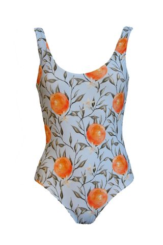 orange print swimsuit, sustainable swimwear