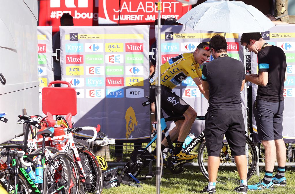 Chris Froome warms down after the stage