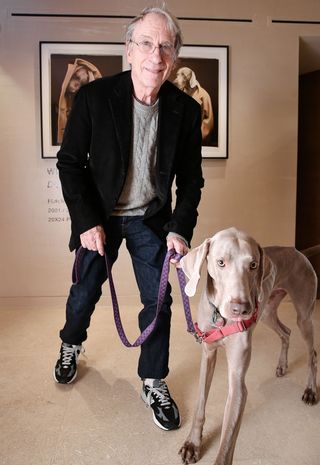 William Wegman and his model at the exhibition’s opening in New York last week