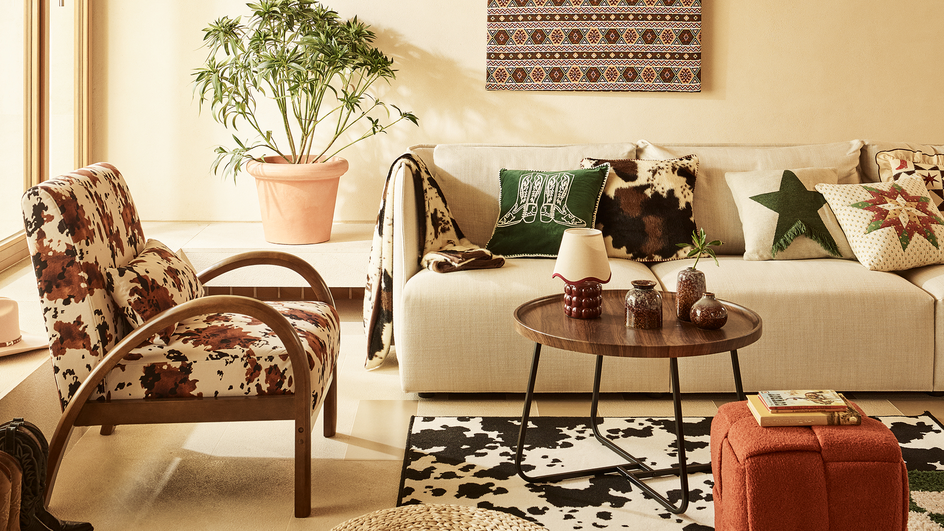 Beige living room with cow print accessories