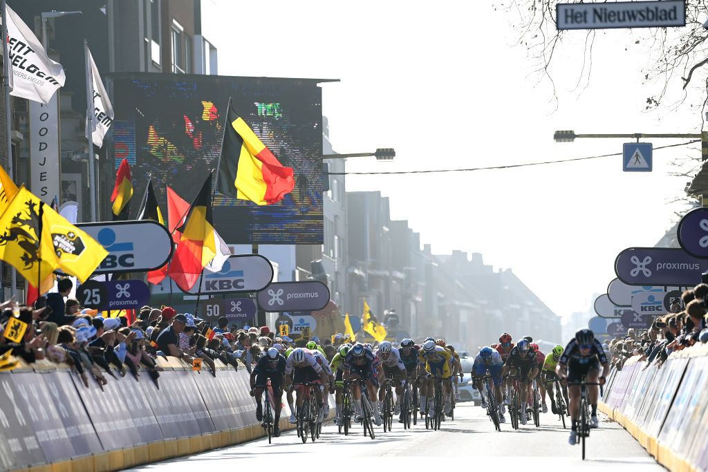 WEVELGEM BELGIUM MARCH 27 LR Ivan Garcia Cortina of Spain and Movistar Team Mads Pedersen of Denmark and Team Trek Segafredo Arnaud Demare of France and Team Groupama FDJ Greg Van Avermaet of Belgium and AG2R Citren Team and Luka Mezgec of Slovenia and Team BikeExchange Jayco sprint at finish line during the 84th GentWevelgem in Flanders Fields 2022 Mens Elite a 2488km one day race from Ypres to Wevelgem GWE22 WorldTour on March 27 2022 in Wevelgem Belgium Photo by Tim de WaeleGetty Images