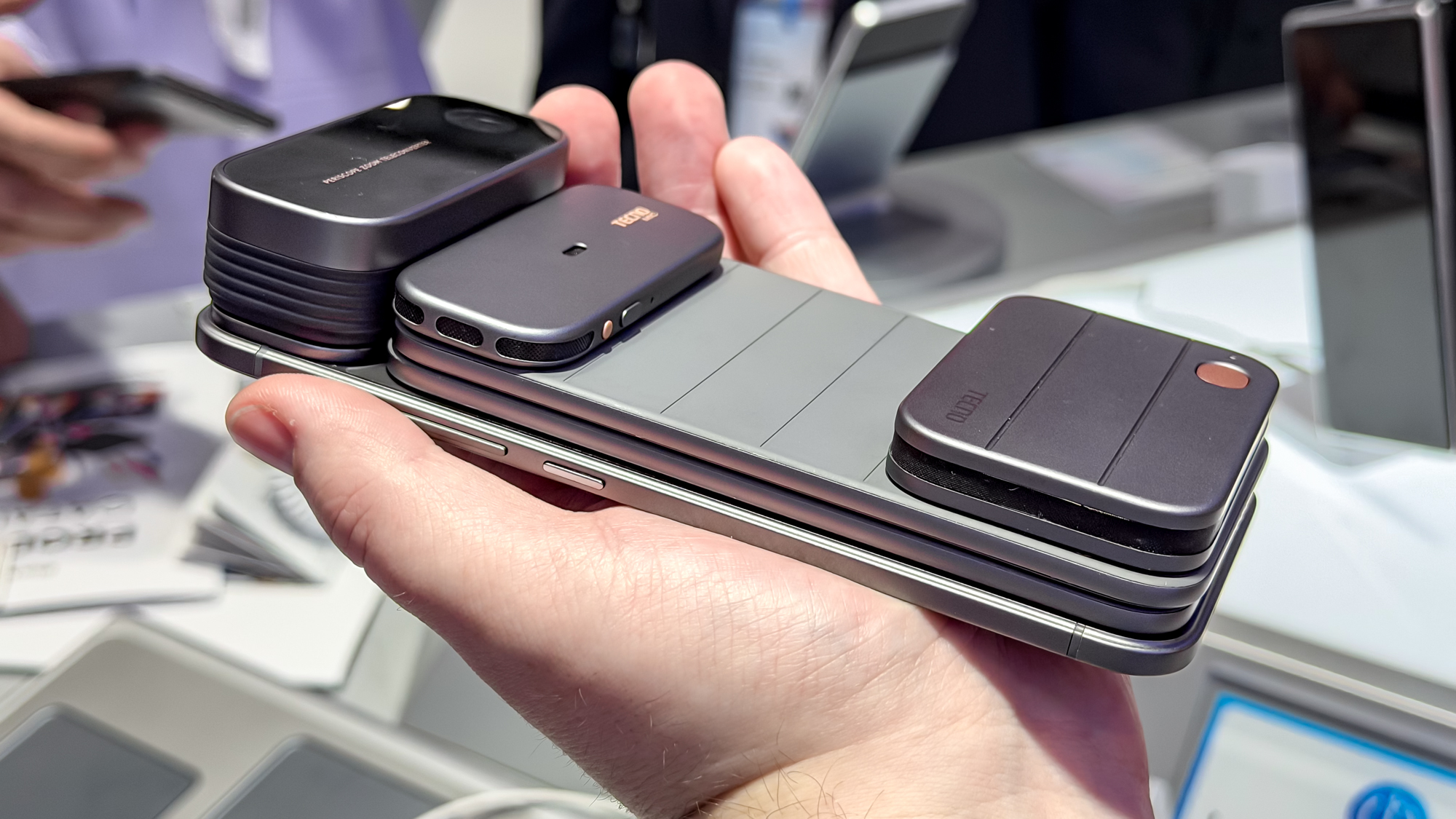 Tecno modular phone with multiple mods attached