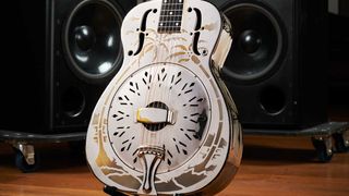 1937 National Style 0 Resonator - the guitar that graced the cover of Brothers In Arms and remains in use today