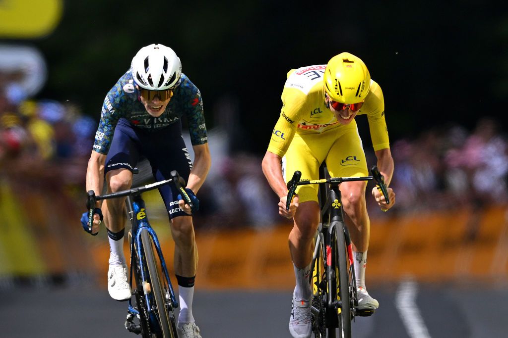 LELIORAN FRANCE JULY 10 EDITORS NOTE Alternate crop LR Jonas Vingegaard Hansen of Denmark and Team Visma Lease a Bike and Tadej Pogacar of Slovenia and UAE Team Emirates Yellow Leader Jersey sprint at finish line to win the stage during the 111th Tour de France 2024 Stage 11 a 211km stage from EvauxlesBains to Le Lioran 1239m UCIWT on July 10 2024 in Le Lioran France Photo by Dario BelingheriGetty Images