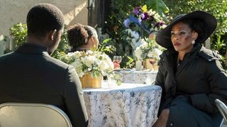 Damson Idris as Franklin and Angela Lewis as Louie talking after Jerome's funeralSnowfall season 6 episode 8