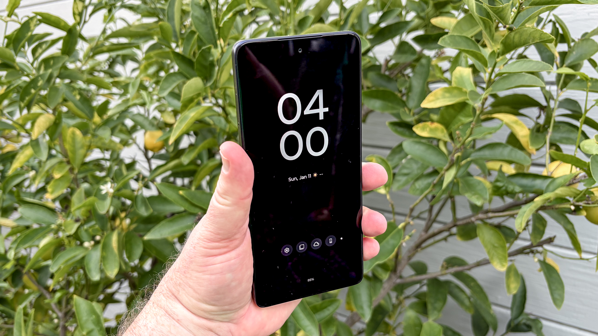 Moto G Power 2026 in hand showing lock screen