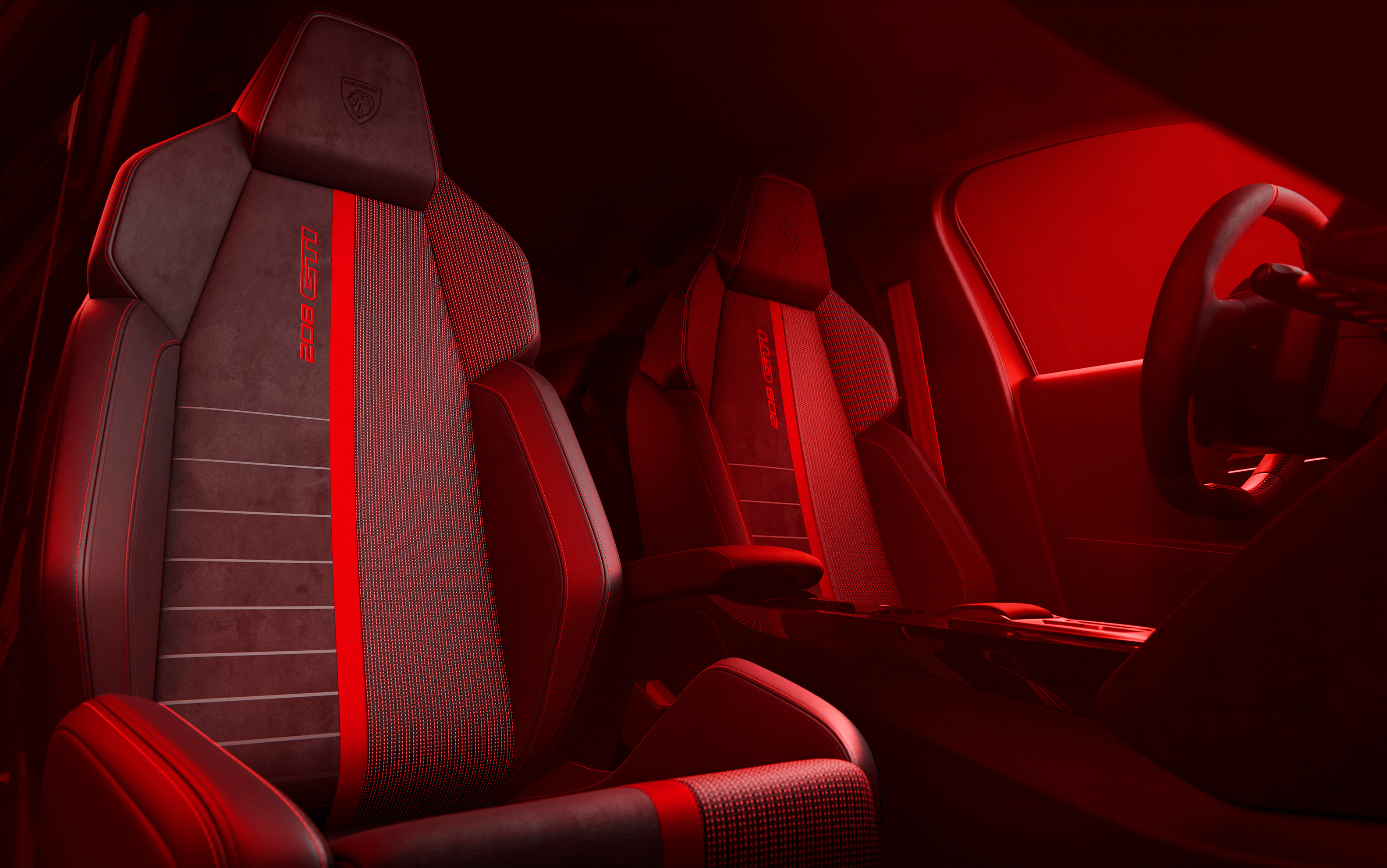 The Peugeot E-208 GTi's sporty interior with race-inspired seats