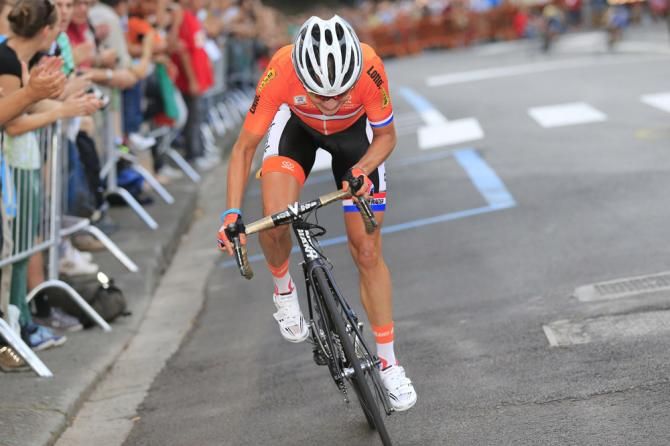 Marianne Vos (Netherlands) launched a blistering attack on the final climb and soloed to her third road race world championship