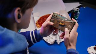 A student gaming with the Samsung Galaxy S23 Ultra