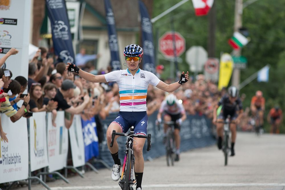 Megan Guarnier wins the Philadelphia International Cycling Classic while wearing the WWT leader's jersey.