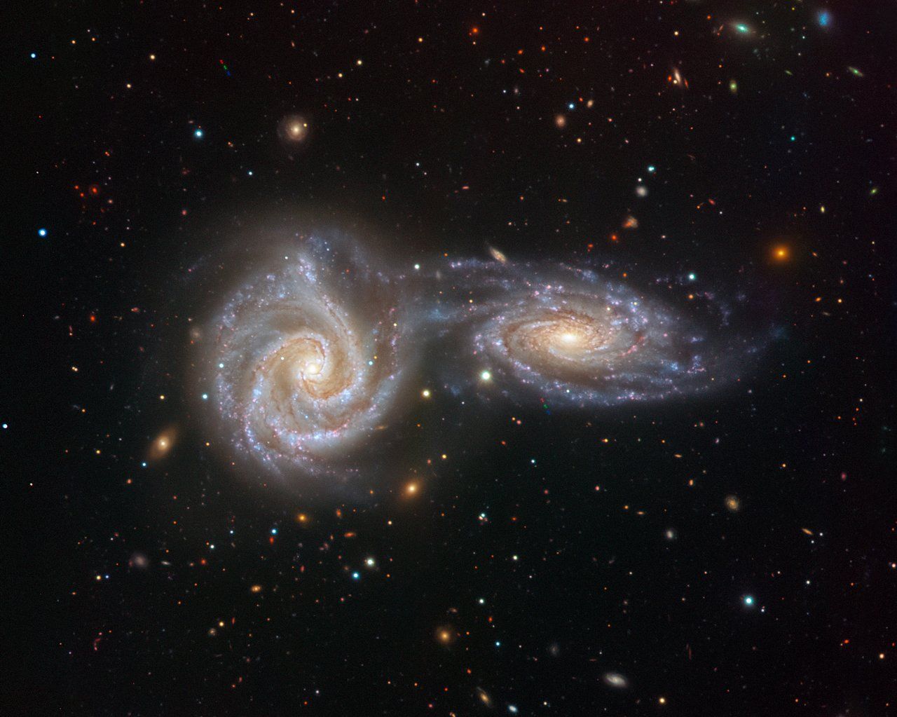 Two interacting galaxies, individually named NGC 5426 and NGC 5427 and collectively known as Arp 271, were captured by the VLT's now defunct Visible Multi-Object Spectrograph. The galaxies are 110 million light-years away.