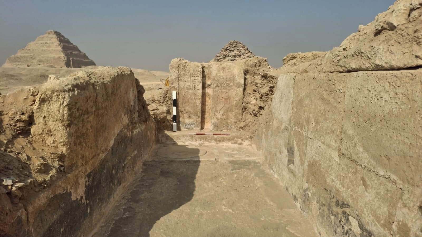 A view of part of a tomb in the desert.