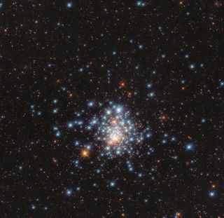 These "galactic fireworks" are the colorful stars which make up the globular cluster NGC 1805, as seen in this photo taken by the Hubble Space Telescope. This cluster of thousands of stars is located out at the edge of the large Magellanic Cloud.