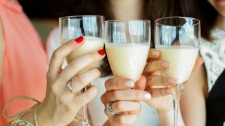 picture of three women toasting with irish cream