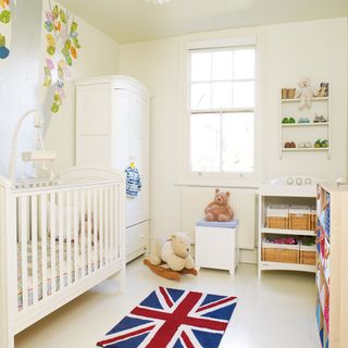 mwhite children's bedroom with cupboard