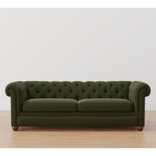 olive green upholstered chesterfield couch