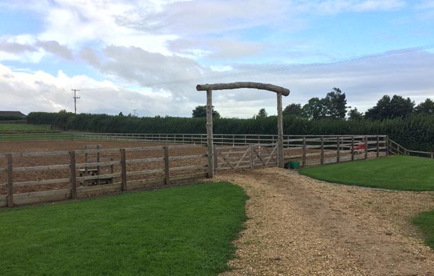 Riding facilities include a large outdoor arena