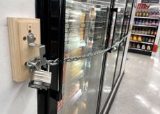A chain with padlocks secures freezer doors at a Walgreens store 