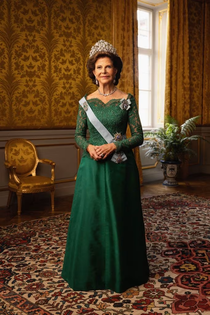 Queen Silvia wearing a green gown and diamond tiara