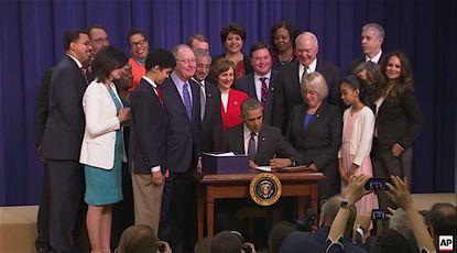 President Obama signs the Every Student Succeeds Act