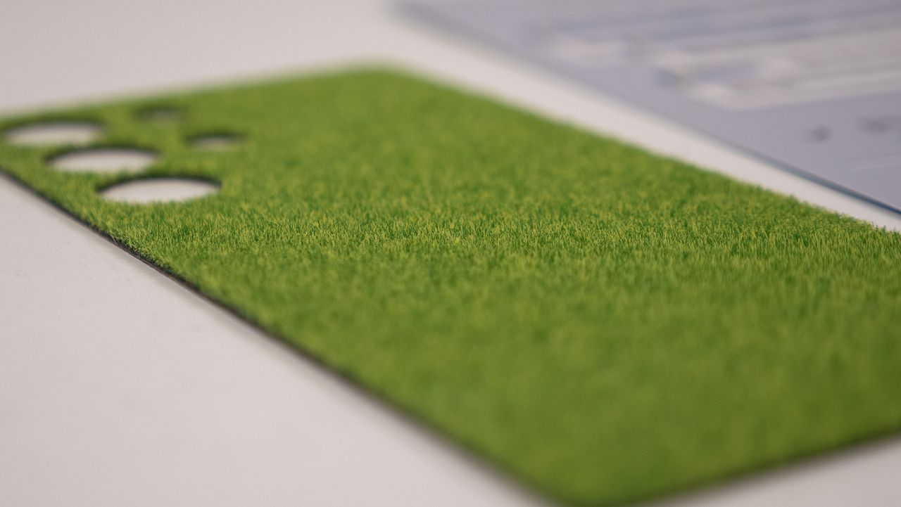 The texture of the Touch Grass DBrand skin