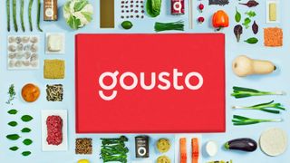 Gousto box surrounded by food