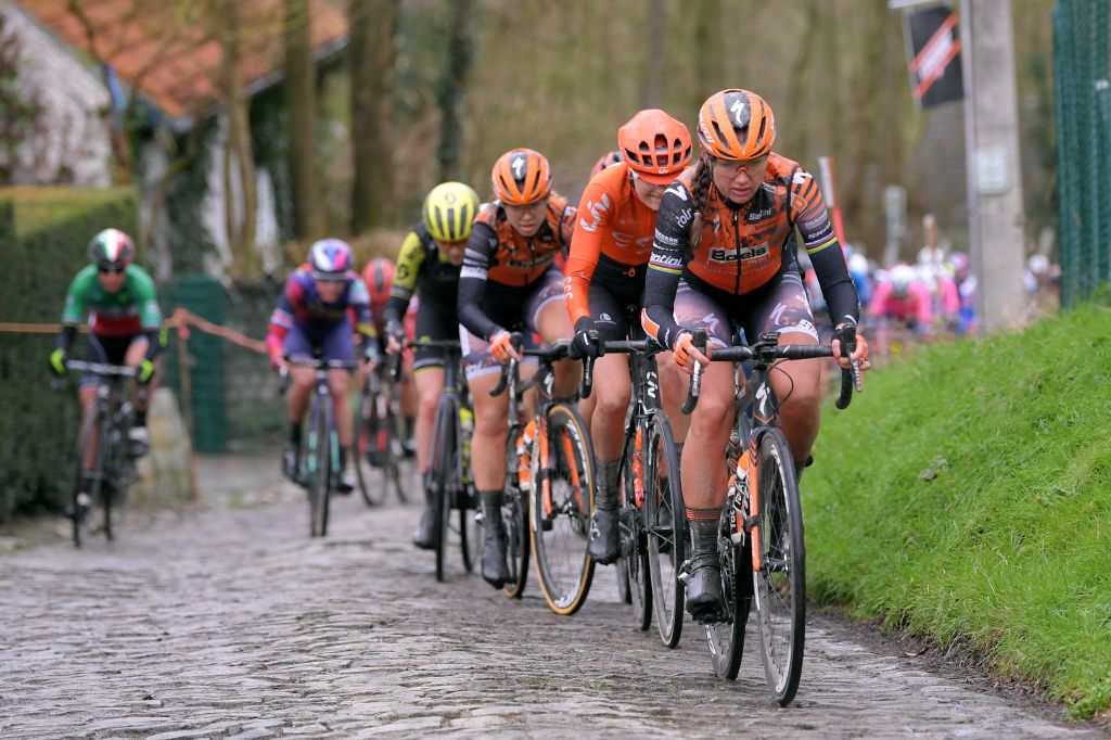 NINOVE BELGIUM FEBRUARY 29 Chantal Blaak of The Netherlands and Boels Dolmans Cycling Team Jeanne Korevaar of The Netherlands and Team CCC Liv Jip Van Den Bos of The Netherlands and Boels Dolmans Cycling Team Cobblestones Mud during the 75th Omloop Het Nieuwsblad 2020 Women Race a 1229km race from Ghent to Ninove OmloopHNB OHN20 OHNwomen on February 29 2020 in Ninove Belgium Photo by Luc ClaessenGetty Images